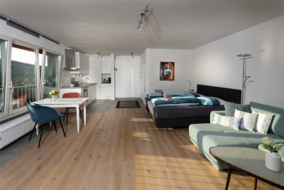 Moderne, vollständig ausgestattete und möbilierte 1- Zimmerwohnung mit Aussicht, grenznah, befristet