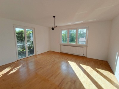 große helle und freundliche Wohnung (unmöbliert) in einem Zweifamilienhaus mit eigener Terrasse und Gartenmitbenützung