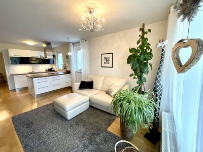 Rif - Neuwertige 3-Zi.-Gartenwohnung mit TG-Stellplatz und Freistellplatz