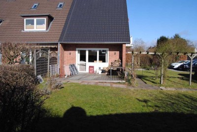 Gepflegtes Reihenendhaus mit Garten, Kamin und Garage zu vermieten.