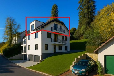 Traumhafte Dachgeschosswohnung mit Balkon und Fernsicht