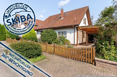 Ansprechendes Wohngebiet in Ringen: Einfamilienhaus mit Garten und Garage