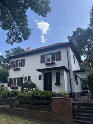Charmantes Einfamilienhaus mit wunderschönem Garten