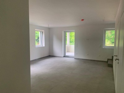 Erstbezug: Traumhafte Maisonette mit großzügigem, überdachtem Balkon