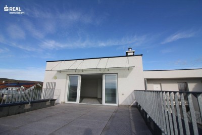 Terrassenwohnung mit 2 Garagenplätzen