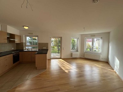 Charmante 3-Zimmer-Wohnung mit Südterrasse, Gartenanteil & hochwertiger Schreinerküche