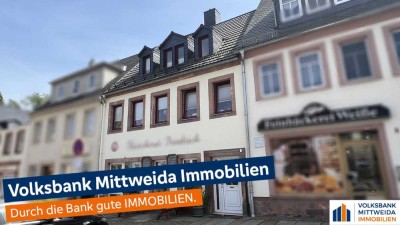 Wohnhaus mit Ladengeschäft im Erdgeschoss in zentraler Lage