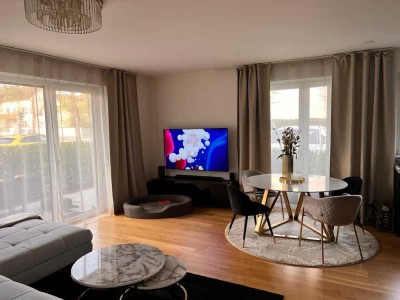 Moderne 2-Zimmer-Erdgeschosswohnung mit Garten, Terrasse und Einbauküche mit Aufpreise