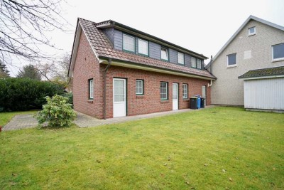 Attraktive Maisonettewohnung mit Garten, Terrasse und Garage