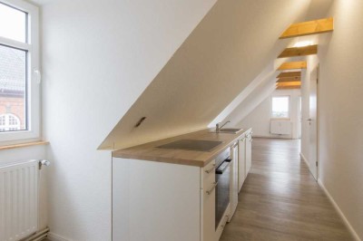 Helle Dachgeschosswohnung mit fantastischem Schleiblick vom Sonnenbalkon