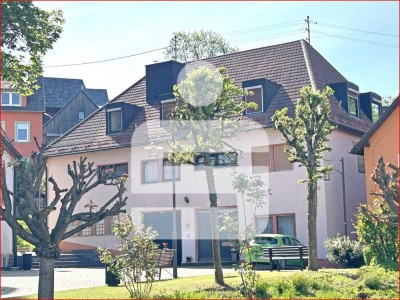 Attraktives Mehrfamilienhaus mit ehemaliger Gewerbeeinheit
