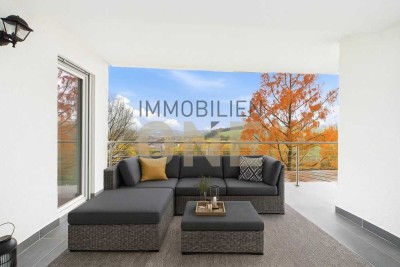 Ebenerdiges Wohnen der Extraklasse! EG-Wohnung mit Garten, Süd-West Loggia & traumhaftem Weitblick