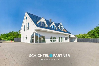 Uphusen | Mondänes Wohn- & Geschäftshaus mit großem Hinterhof und Autohalle