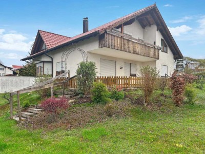 Familienidylle in Sonnenbühl – Einfamilienhaus mit großem Grundstück und Garage