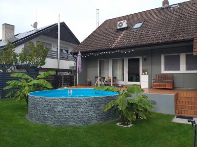 Exklusive Wohlfühloase mit Garten, Pool & Einliegerwohnung - Freistehendes Bungalow in ruhiger Lage