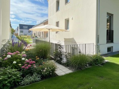 Moderne Maisonette mit Garten & zwei Terrassen im parkähnlichen Neubau