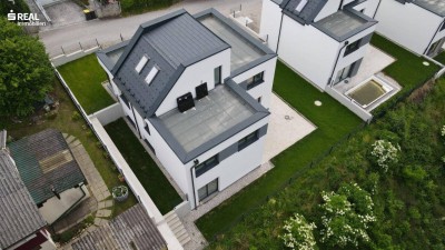 Neubau -Wohnung mit Dachterrasse und Garten