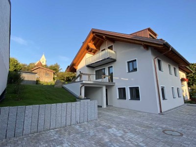 Exklusive 3-Zimmer-Erdgeschosswohnung mit geh. Innenausstattung mit Terrasse und Garten