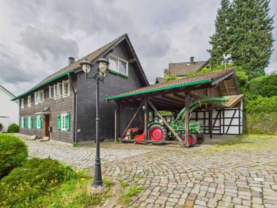 Charmantes Einfamilienhaus in Top-Lage mit Einliegerwohnung und großzügigem Carport