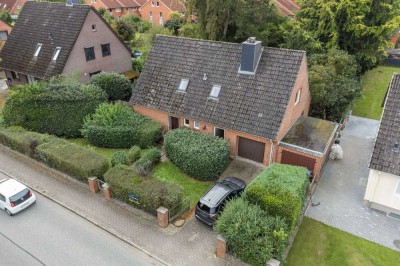 Stadtnah leben und grünen Garten genießen - Modernisieren Sie Ihr Traumhaus!