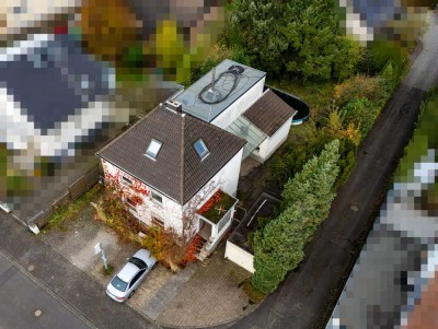 Rösrath: Freistehendes Zweifamilienhaus oder Baugrundstück mit vielen Möglichkeiten!