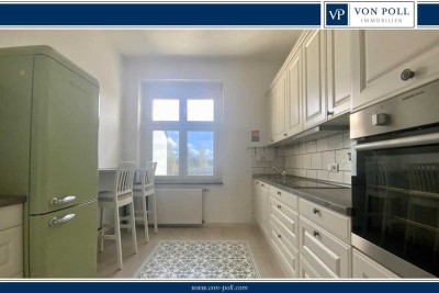 Modernisierte Vier-Zimmer-Wohnung inklusive Einbauküche, Stellplatz und bester Aussicht