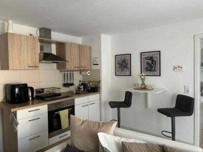 Ansprechende 2-Zimmer-Souterrain-Wohnung mit Balkon und EBK in Siegen