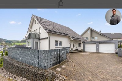 Ebenerdige Eigentumswohnung mit Terrasse und Garage im 3-Familienhaus