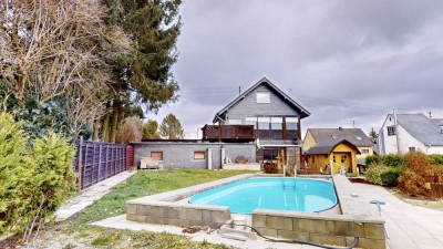 Zweifamilienhaus auf großzügigem Grundstück mit Pool und Sauna zum Kauf in Dichtelbach