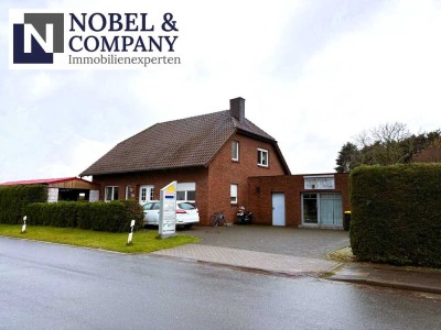 Platz für Familie und Erfolg: Einfamilienhaus mit Carport, Gewerbeeinheit & Weitblick