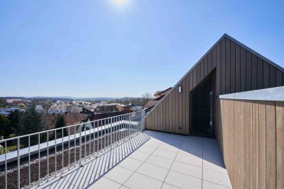 Großzügige 2-Zimmer-Wohnung mit Balkon und Dachterrasse