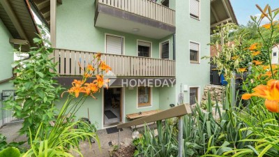 Modernisierte Souterrain-Wohnung mit guter Rendite, Terrasse, Garten & Stellplatz in ruhiger Lage