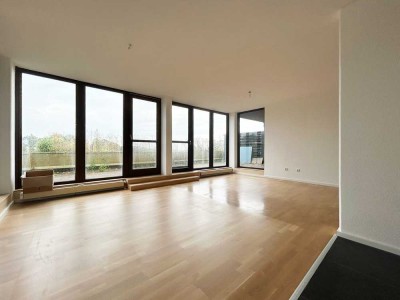 Einzigartige 3-Zimmer-Wohnung mit eindrucksvoller Sonnenterrasse