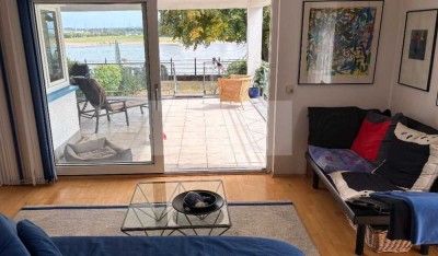 TOP Wohnung in TOP Lage. Eigentumswohnung direkt am Rhein mit eigenem Garten!