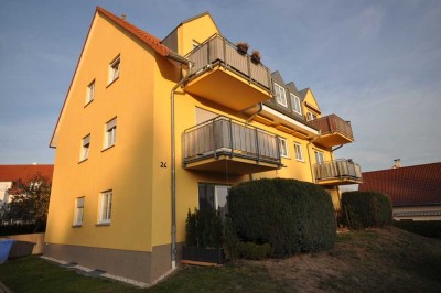 Dachgeschosswohnung mit Fußbodenheizung, Balkon und PKW Stellplatz