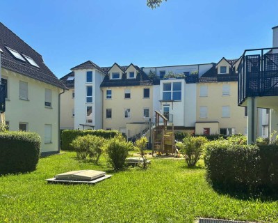 Frei werdend -  Maisonettewohnung mit Balkon und Tiefgaragenstellplatz