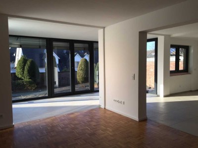 Großzügige Wohnung mit Terrasse und Garten in einem gepflegten Haus