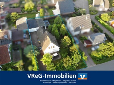 Ruhig gelegenes Einfamilienhaus mit zwei Garagen in Barmstedt zu verkaufen