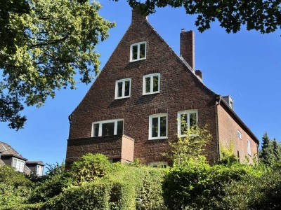 Lichtdurchflutete Maisonette-Wohnung mit einem Hauch Fördeblick