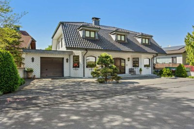 Exklusives Einfamilienhaus mit traumhaftem Gartenparadies in Lohmar