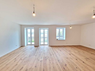 *Cityliving mit Charakter: Neubauwohnung in historischem Gebäude* 4-Zimmer-Wohnung mit 2 Balkonen