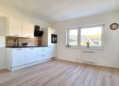 Attraktive Eigentumswohnung | Erstbezug nach Sanierung | Neue Küche | Loggia | Gartenmitbenutzung