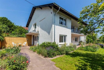 Jung & Kern Immobilien - Großzügiges Zweifamilienhaus in Hanglage mit traumhaftem Grundstück