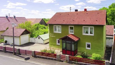 Charmantes Wohnhaus mit vielseitigem Potenzial – ideal für Gartenliebhaber"