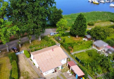 Wohngrundstück mit Seeblick - Haus in Rheinsberg mit großem Grundstück in erster Reihe zum See