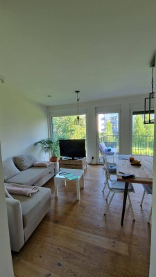 Moderne Wohnung mit 2 Balkonen + Tiefgarage &amp; Garten