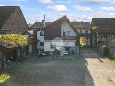 Fachwerkhaus sowie attraktives Wohn- & Geschäftshaus mit vielseitigem Nutzungspotenzial in Kollmarsr