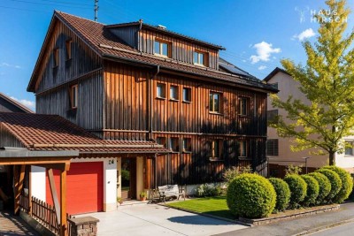 Ruheoase im Grünen – 3-Familienhaus mit Wohlfühlcharakter