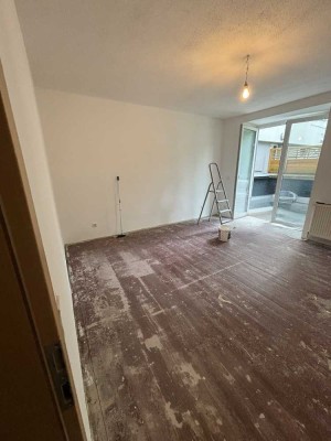 renovierte 2,5-Zimmer-Wohnung mit Garten in Wuppertal- Gestalten Sie Ihr neues Zuhause selbst!