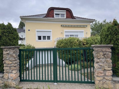 Voll unterkellertes Einfamilienhaus mit Südterrasse und Garage – Ihr neues Zuhause!